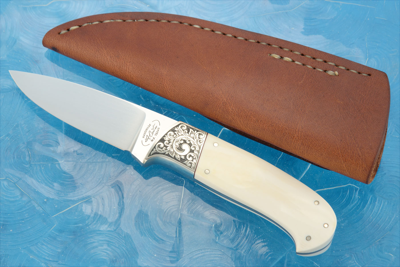Engraved Mammoth Ivory Drop Point Hunter