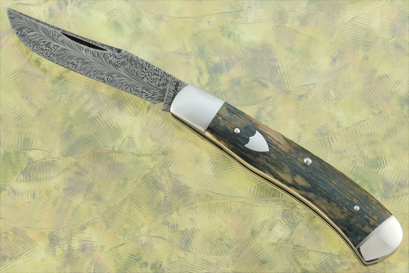 Feather Damascus Slipjoint Trapper with Mammoth Ivory