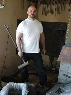 Anthony DiCristofano at the forge