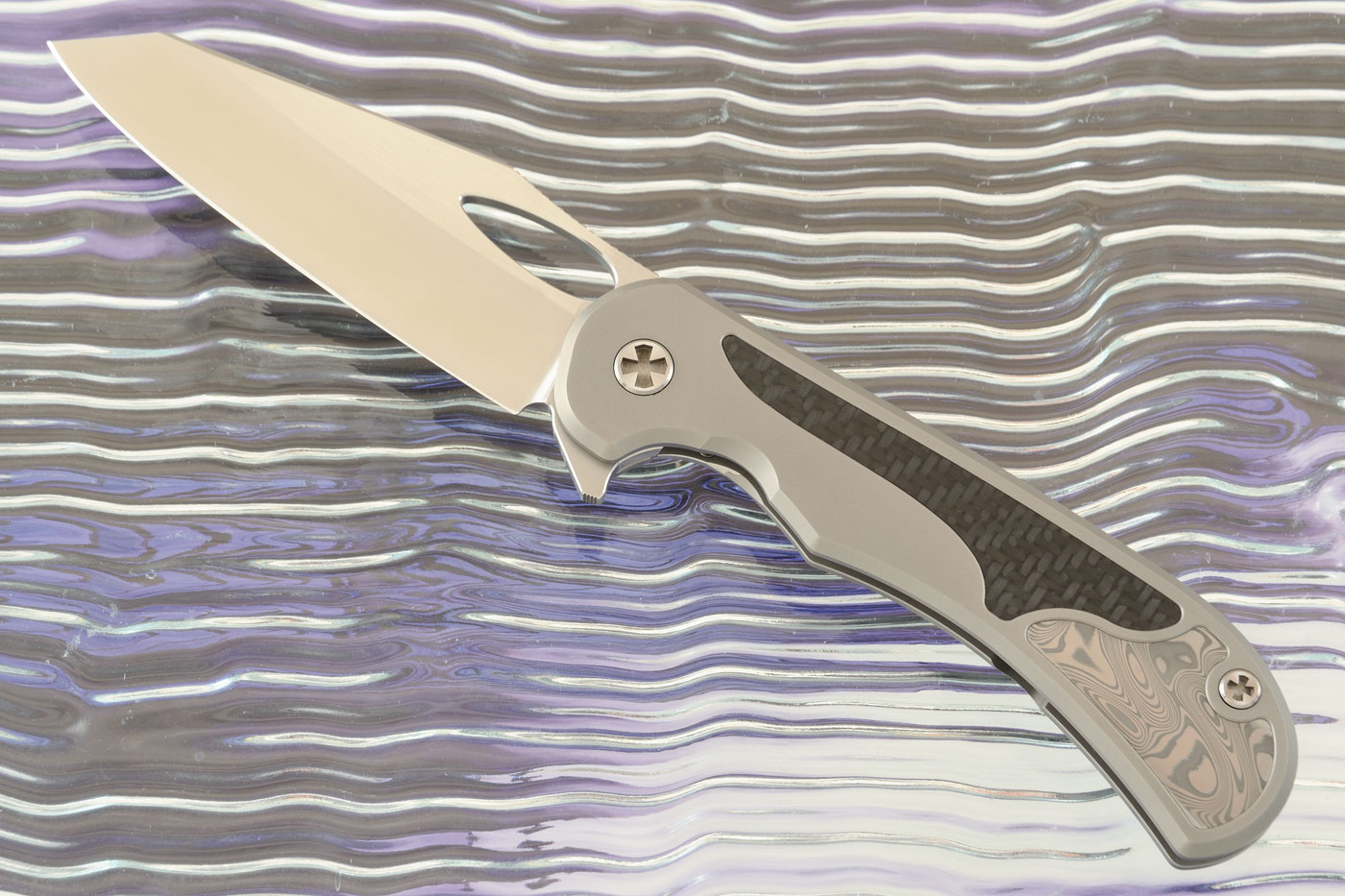 Raptor Framelock Flipper with Carbon Fiber and Damasteel Inlays