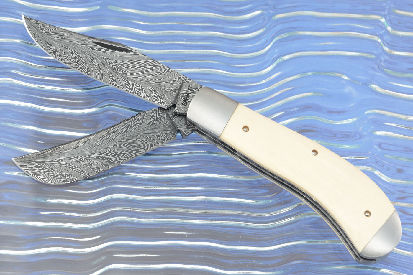 River of Fire Damascus Two Blade Trapper with Mammoth Ivory