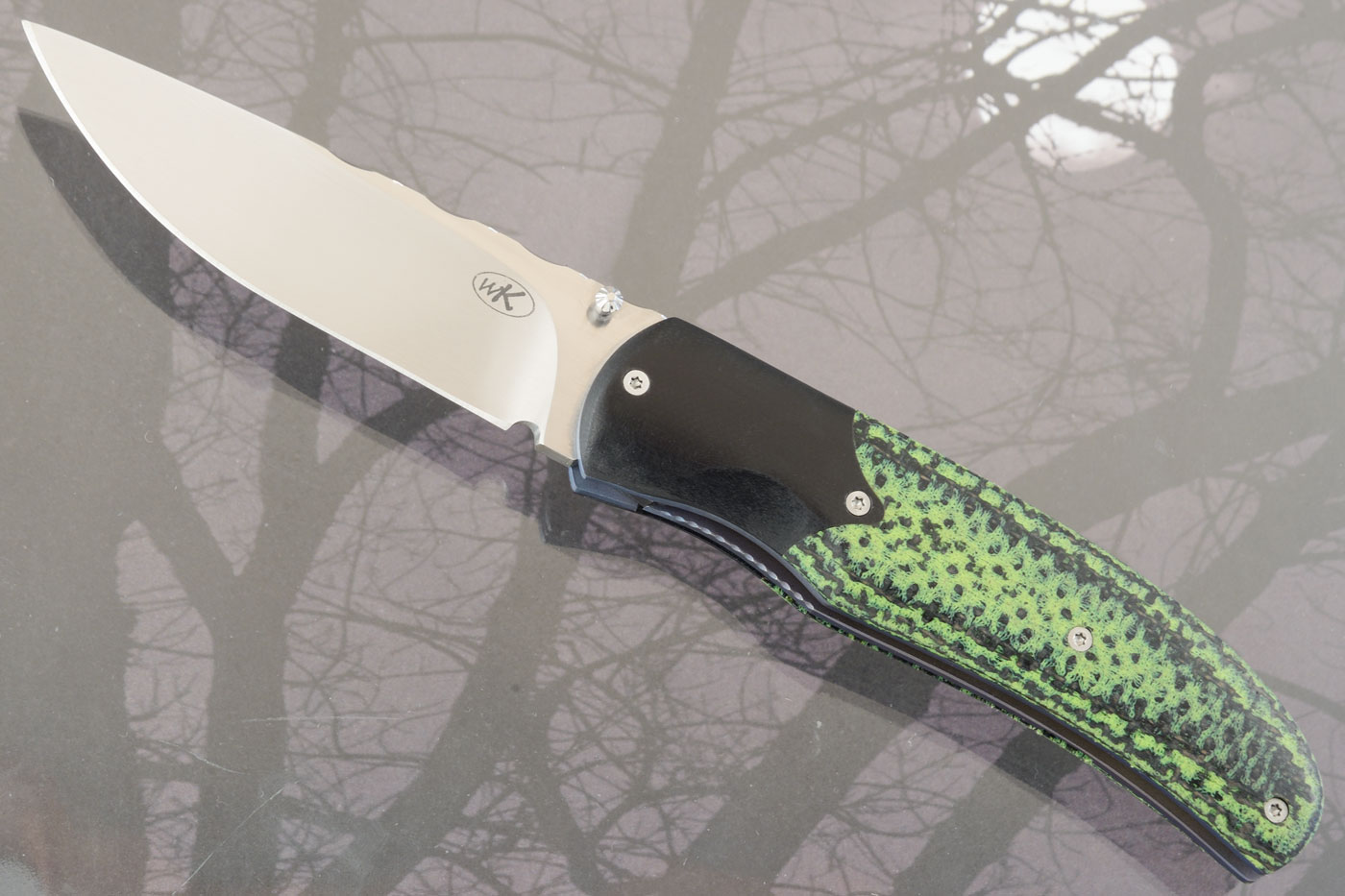Ratel with Green/Black Carbon Fiber and G10