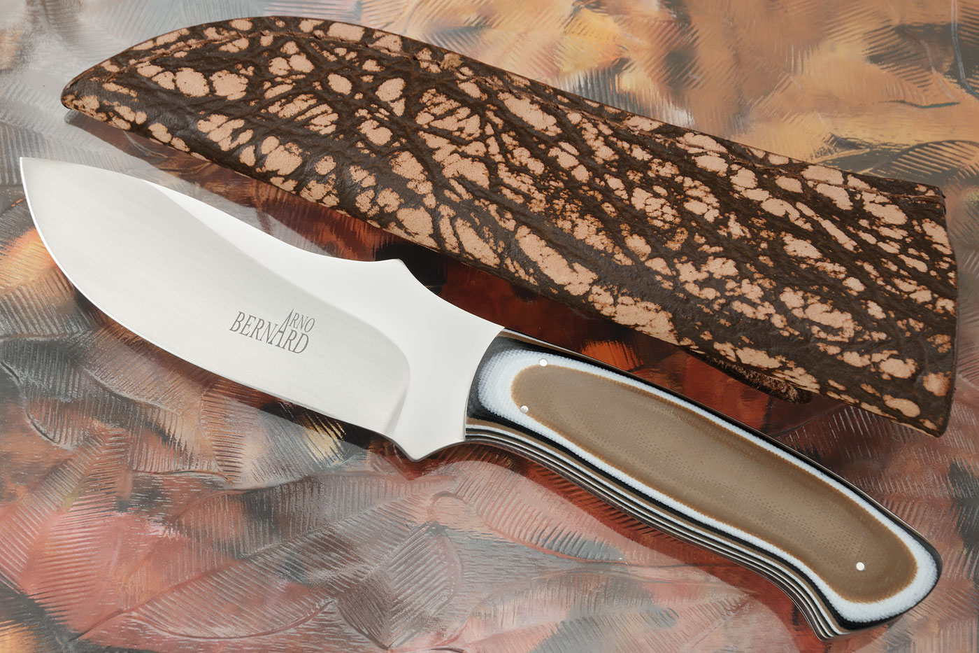 Raised Clip Point Skinner with Stacked G10