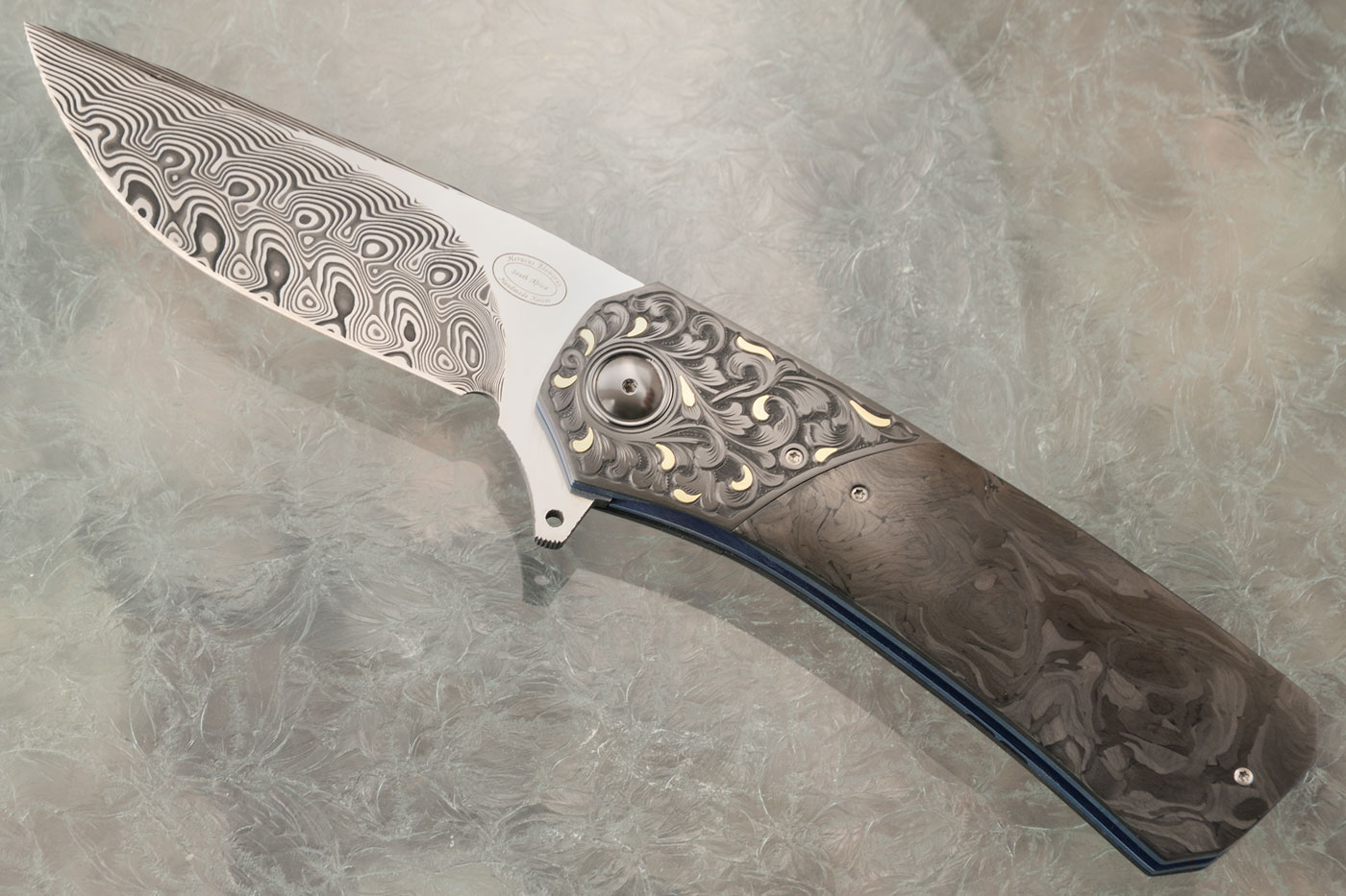 LL15 Flipper with Damascus, Engraved Zirconium, Gold Inlay, and Marble Carbon Fiber