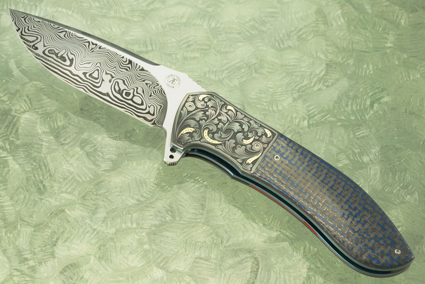 L50 Flipper with Damascus, Blue Lightning Strike Carbon Fiber, and Engraved Zirconium with Gold Inlay (Ceramic IKBS)