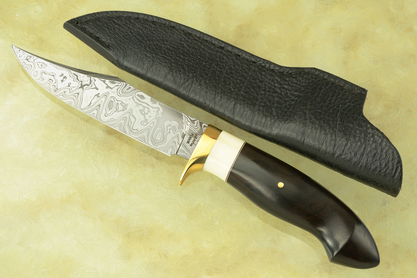 Damascus Clip Point Hunter with African Blackwood and Warthog Tusk