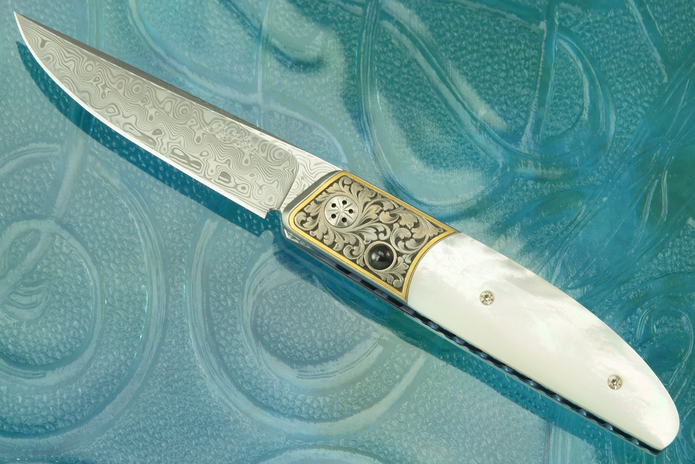 Ball Release Front Flipper with Whitelip Mother of Pearl and Engraved Zirconium