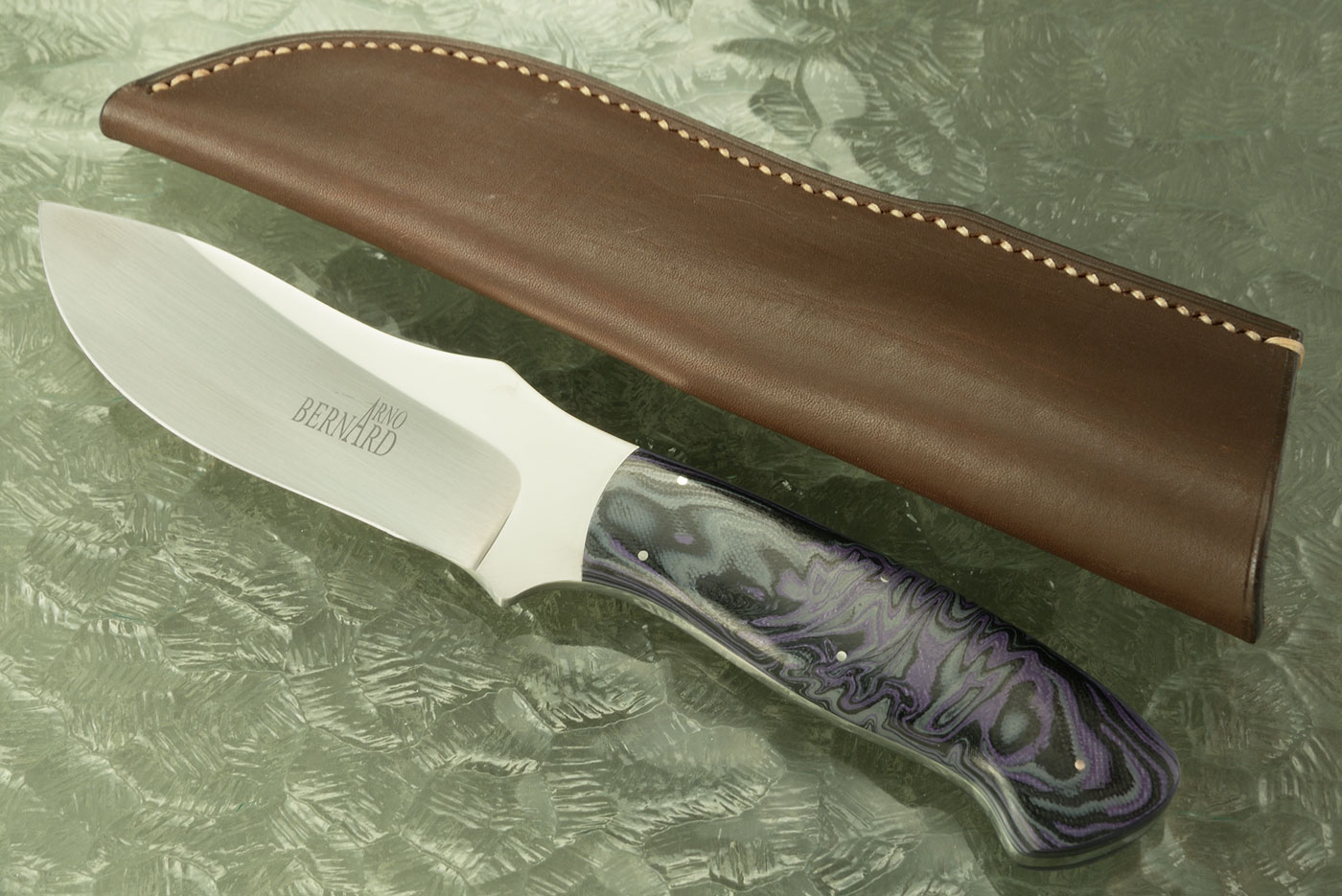 Raised Clip Point Skinner with Marbled G10