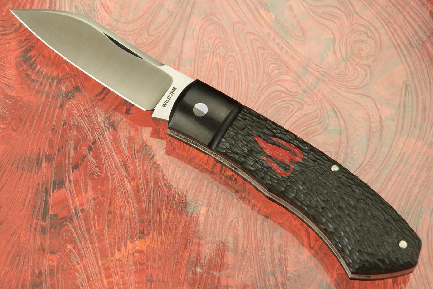 Dino Slipjoint with Black and Red Paper Micarta