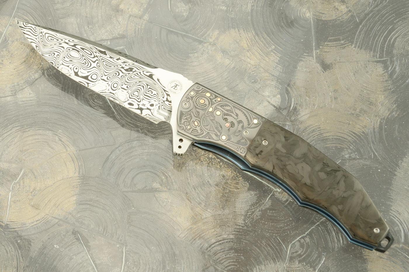 L53 Flipper with Damasteel, Marble Carbon Fiber, and Engraved Zirconium (Ceramic IKBS)