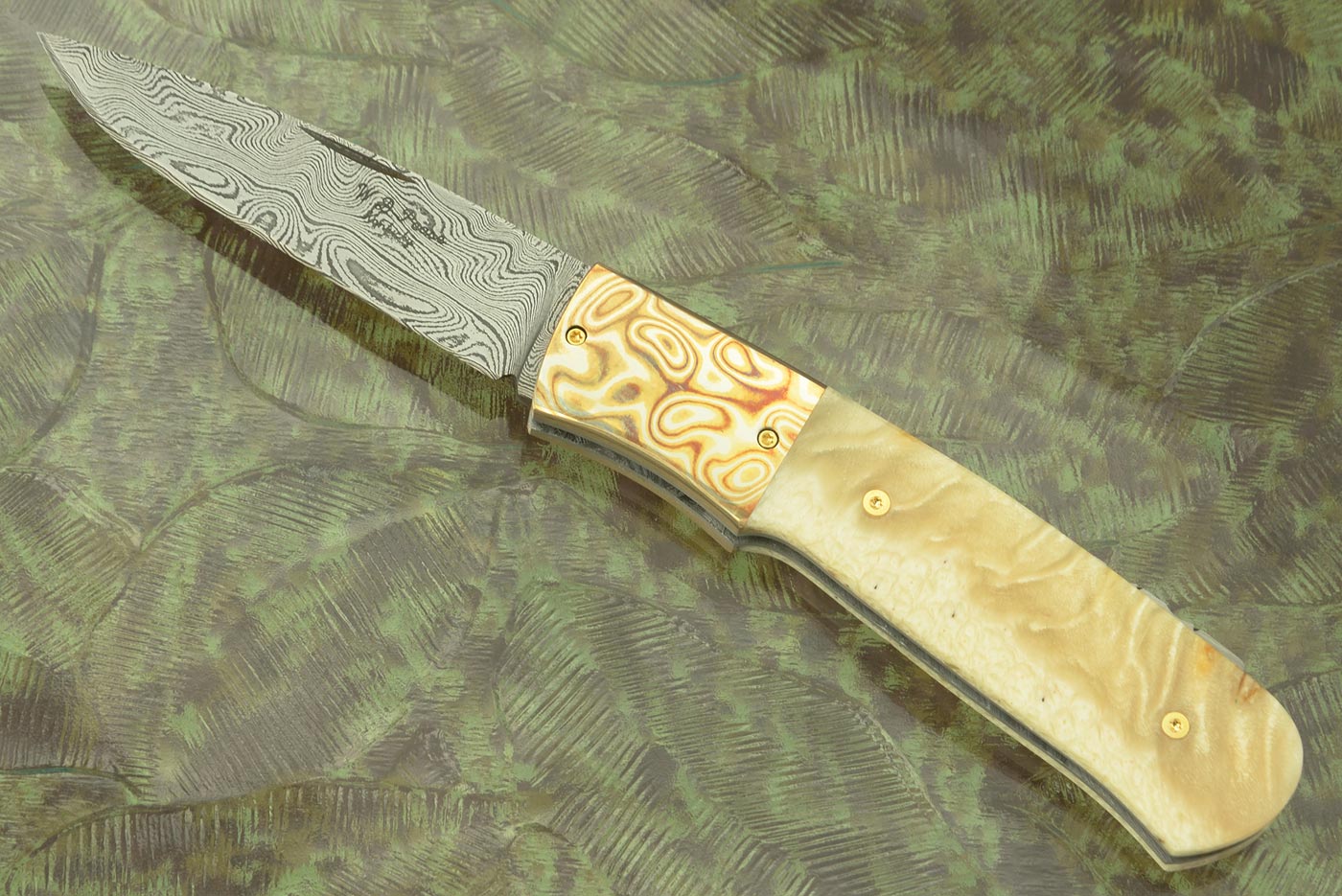 Damascus Backlock with Muskox Horn