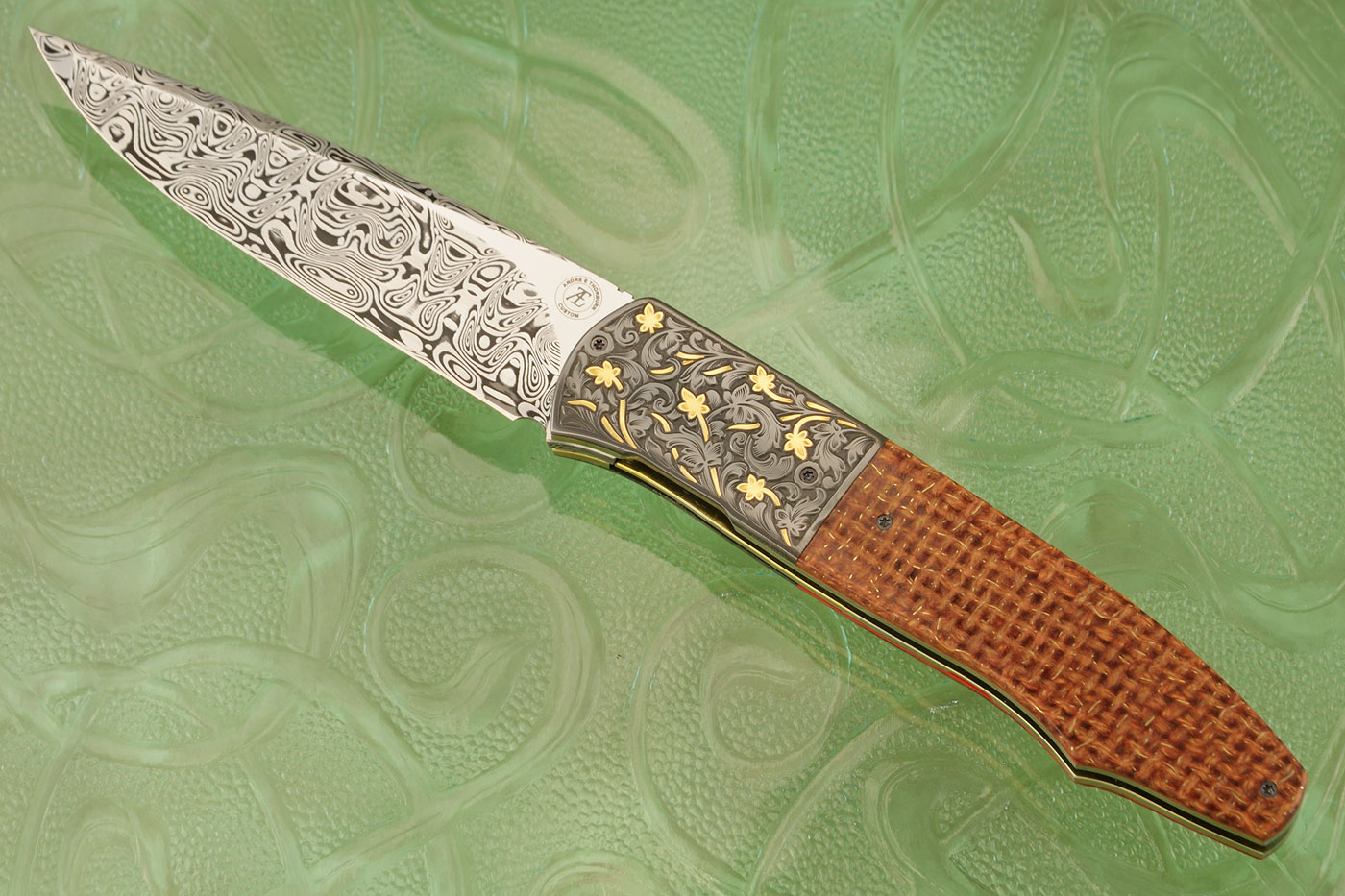 L20 Front Flipper with Thunderstorm Kevlar, Damascus, and Engraved Zirconium (Ceramic IKBS)