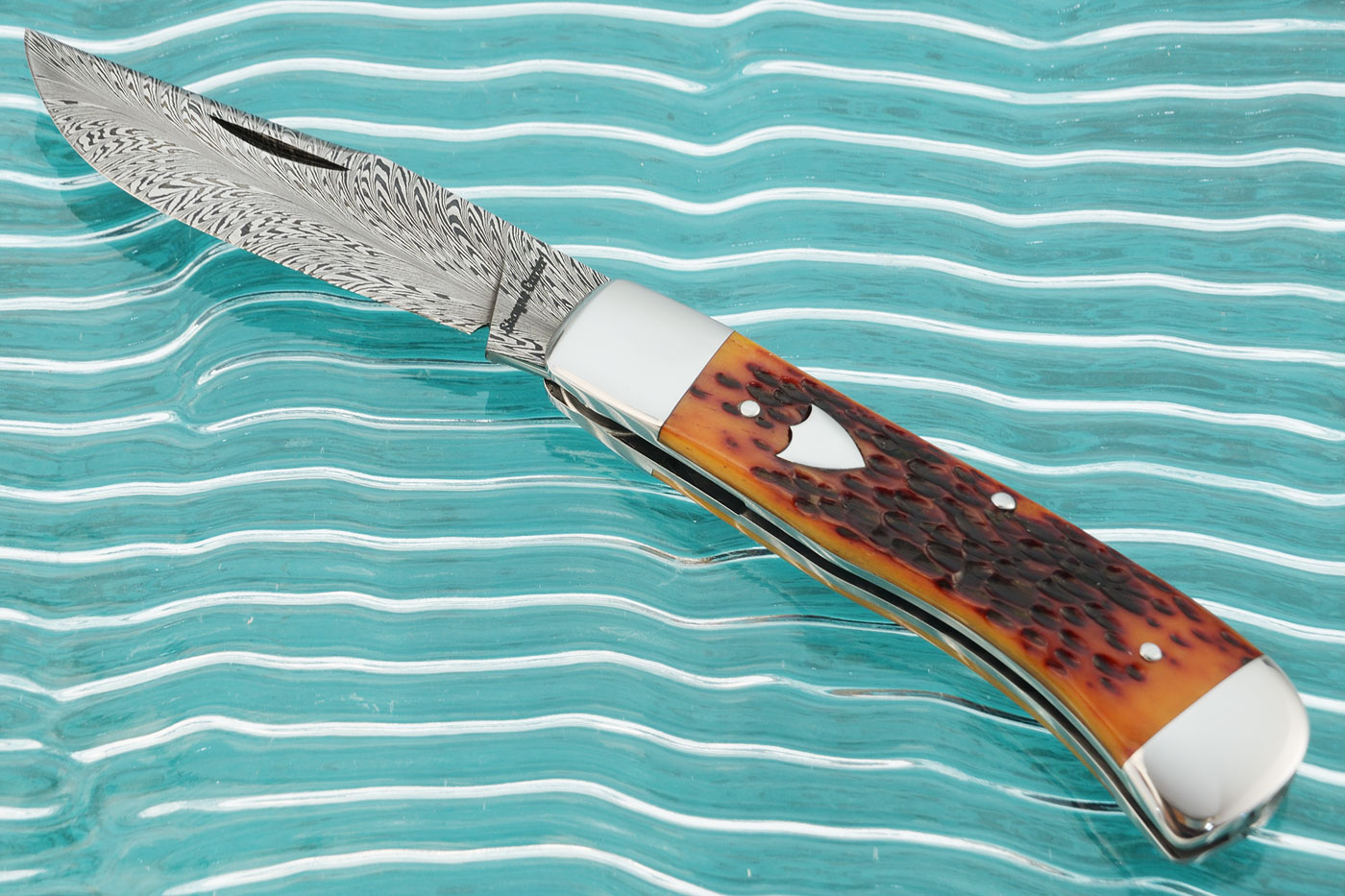 Feather Damascus Slipjoint with Amber Jigged Bone