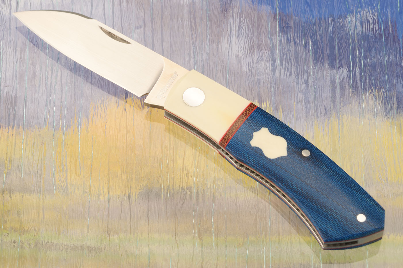 Dino Slipjoint with Blue Crosscut Micarta and Westinghouse Micarta - M390