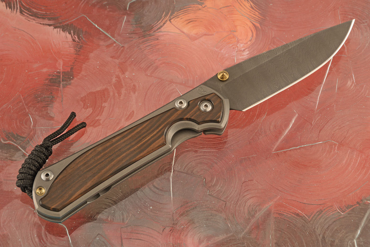 Large Sebenza 31 with Macassar Ebony and Ladder Damascus - Left Handed