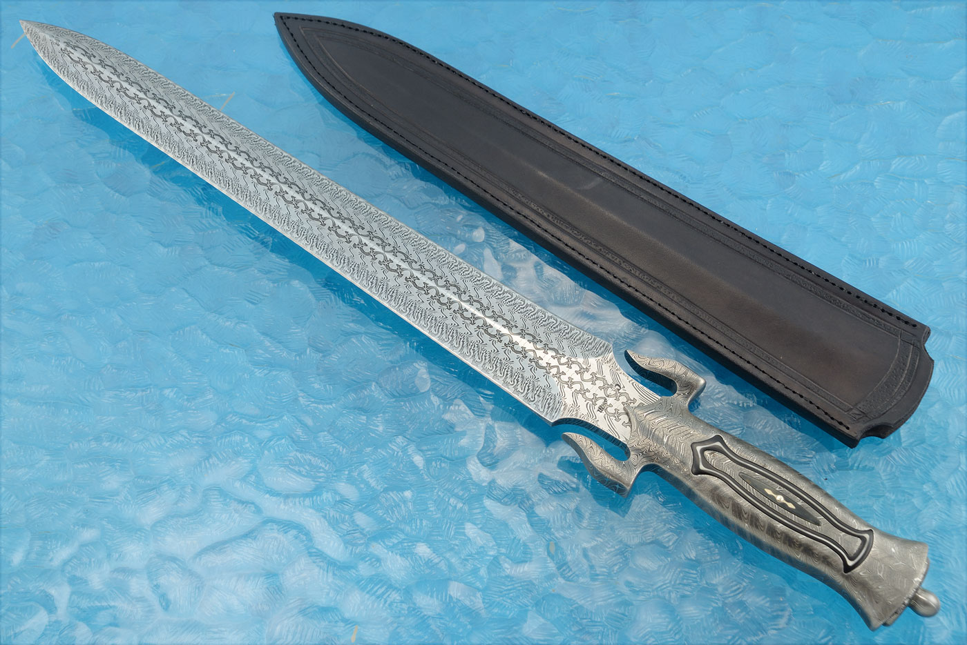 Mosaic Damascus Short Sword with Mamamoth Ivory, Blackwood, and Reindeer Antler