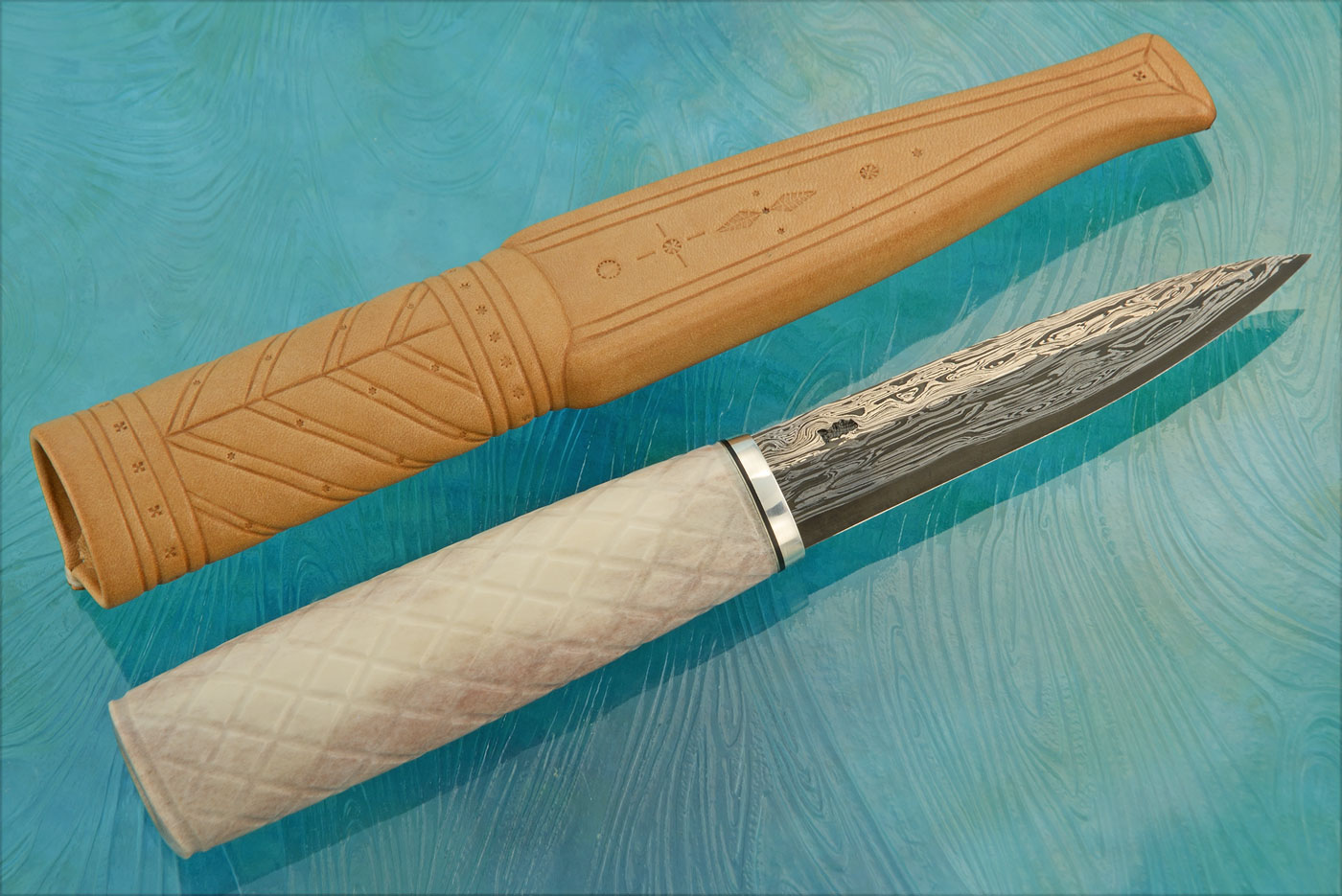 Damascus Puukko with Checkered Reindeer Antler and Sterling Silver