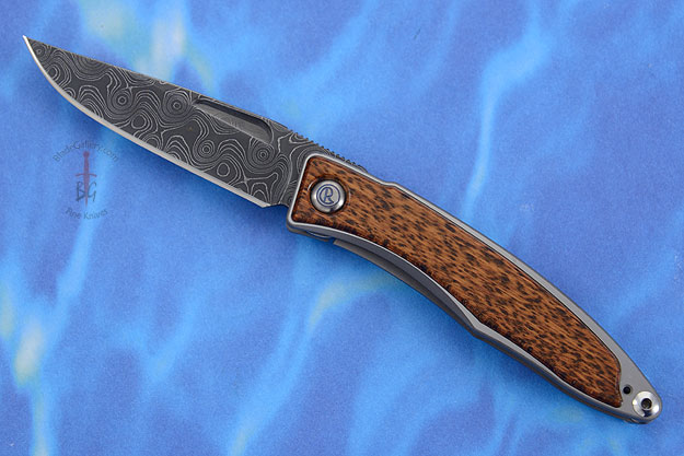 Mnandi with Snakewood and Raindrop Damascus