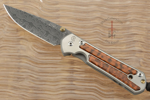 Small Sebenza 21 with Snakewood and Raindrop Damascus