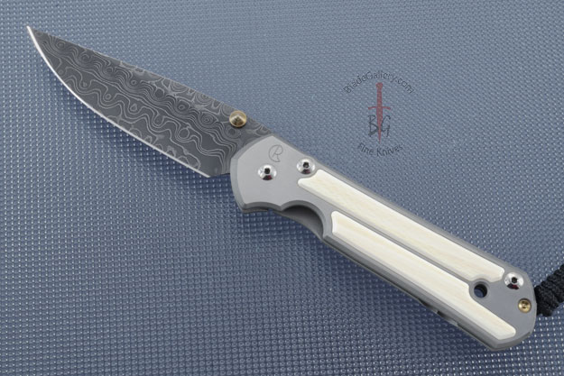 Large Sebenza 21 with Mammoth Ivory and Raindrop Damascus