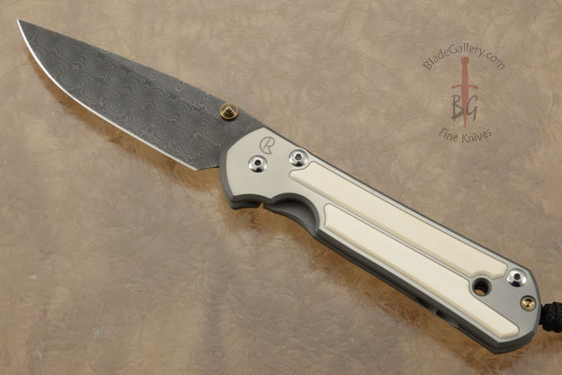 Large Sebenza 21 with Mammoth Ivory and Raindrop Damascus