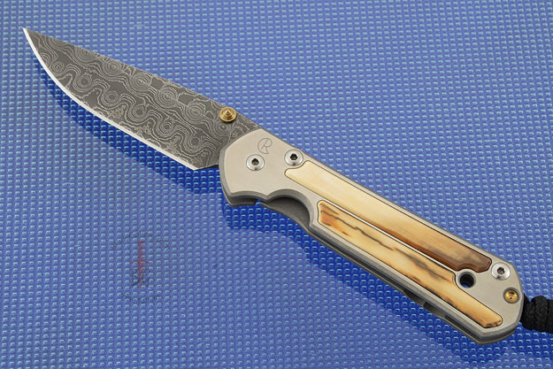 Small Sebenza 21 with Mammoth Ivory Bark and Raindrop Damascus