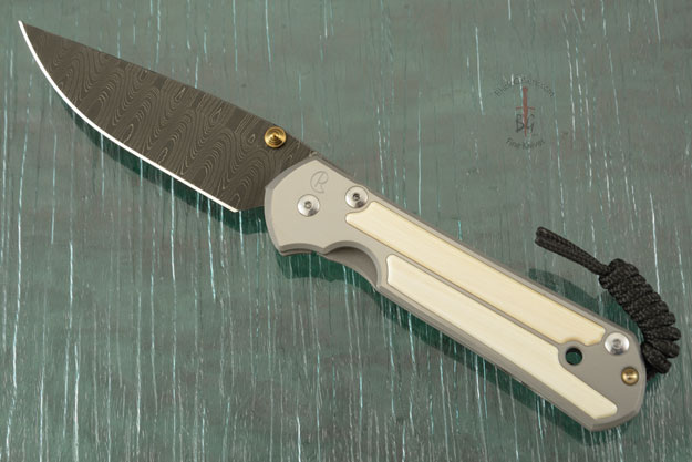 Large Sebenza 21 with Mammoth Ivory and Laddered Damascus