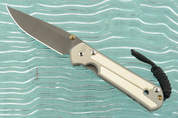 Small Sebenza 21 with Mammoth Ivory and Laddered Damascus