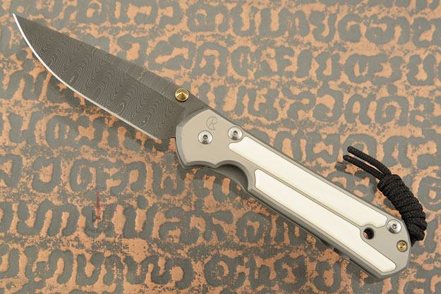 Large Sebenza 21 with Mammoth Ivory and Laddered Damascus
