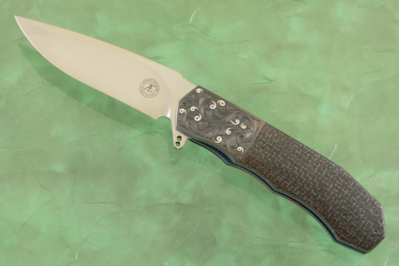 L44 Flipper - Silver Strike Carbon Fiber with Engraved Zirconium and Inlaid Silver (Ceramic IKBS) - M390