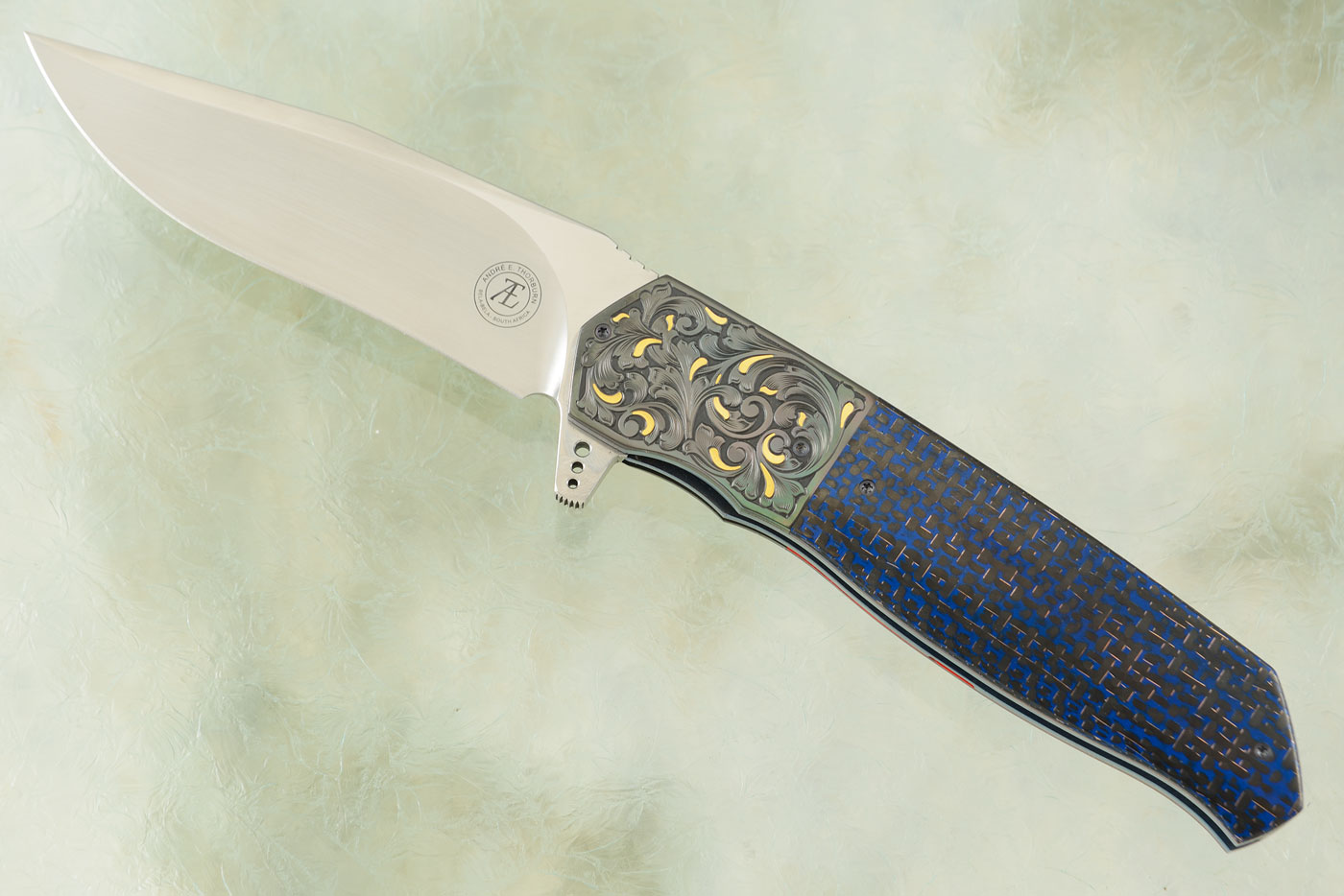 L36M Flipper - Blue Lightning Strike Carbon Fiber with Engraved Zirconium and Gold Inlay (Ceramic IKBS) - M390