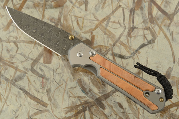 Large Sebenza 21 with Thuya Burl and Raindrop Damascus