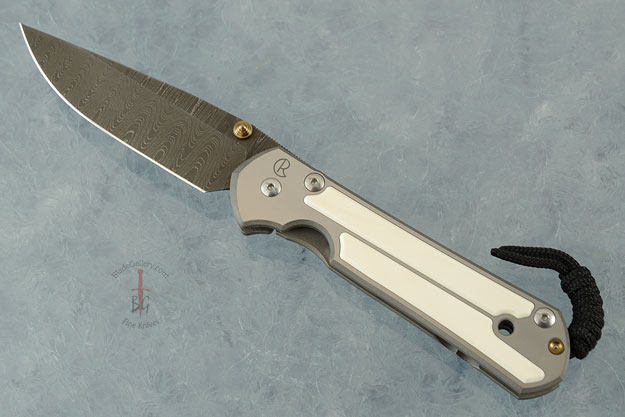 Large Sebenza 21 with Mammoth Ivory and Laddered Damascus