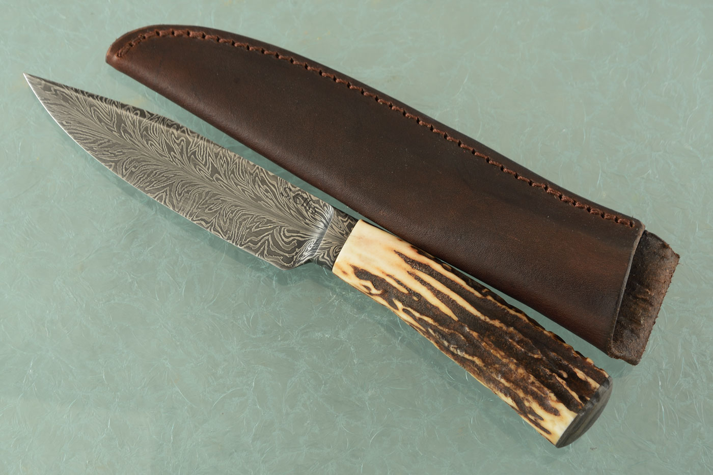 Integral Feather Damascus Hunter with Stag