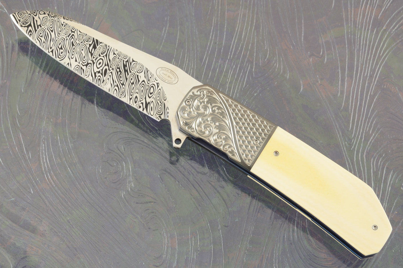 LL14 Flipper with Westinghouse Micarta, Damascus, and Engraved Zirconium (IKBS)